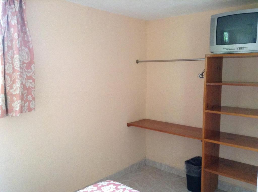 TV a/nebo společenská místnost v ubytování Hotel Tecozautla