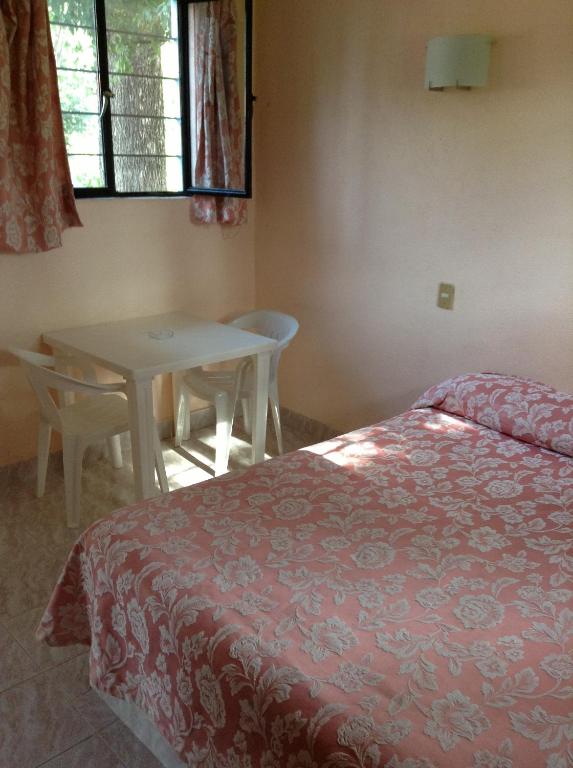 Postel nebo postele na pokoji v ubytování Hotel Tecozautla