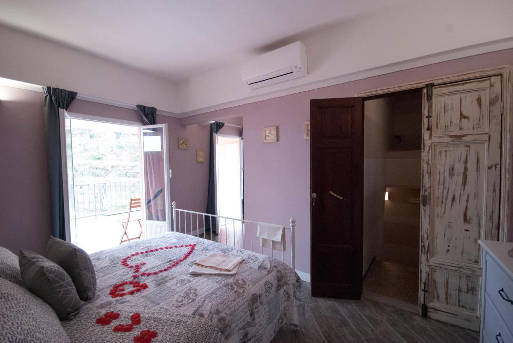 Postel nebo postele na pokoji v ubytování Cà de Lelio
