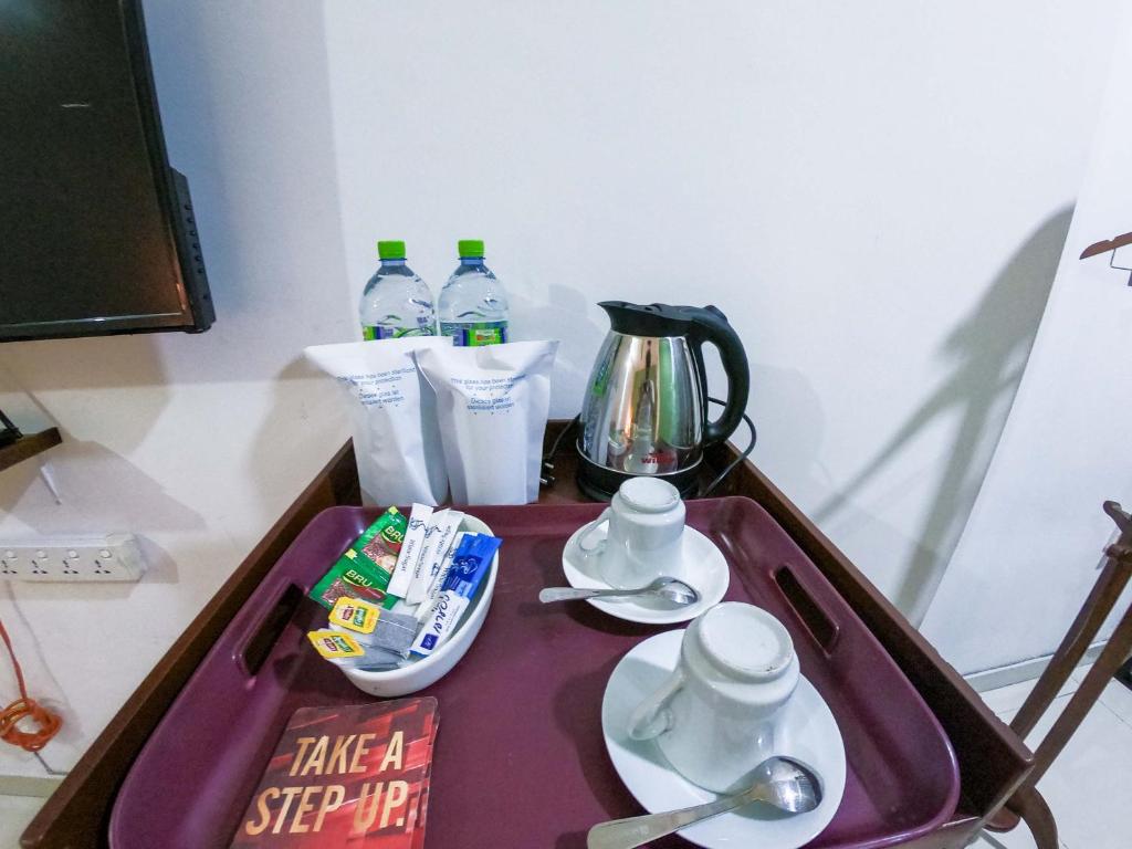 Příslušenství pro přípravu čaje a kávy v ubytování Romance Hills Hotel