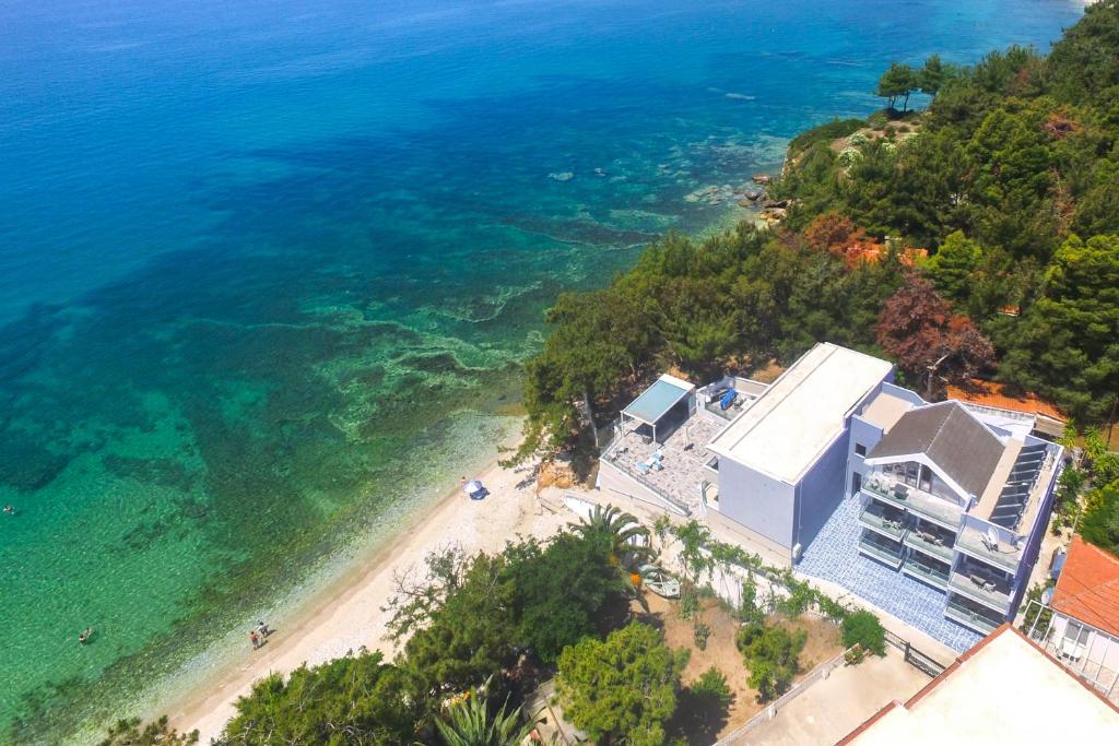 an aerial view of a beach and the ocean at Studios Nautilus III in Potos