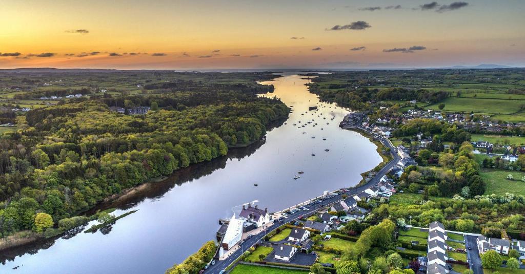 an aerial view of a river in a city at Ice House Hotel in Ballina