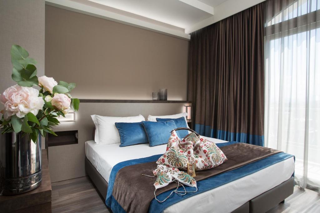 Postel nebo postele na pokoji v ubytování Hotel Continental