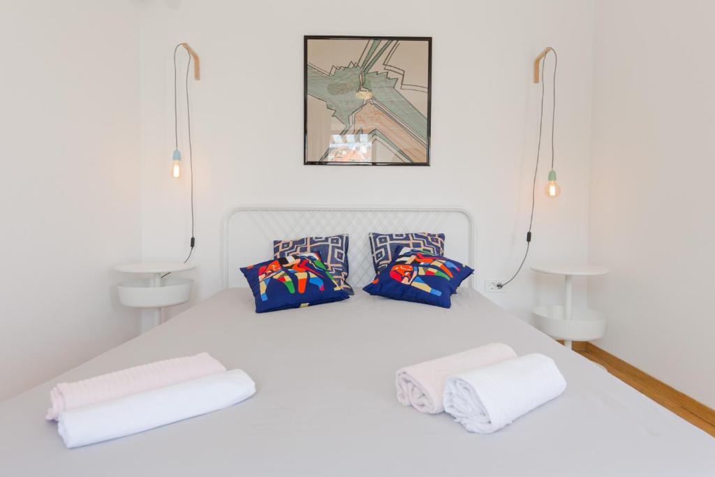 Postel nebo postele na pokoji v ubytování Casa Dubi Hvar