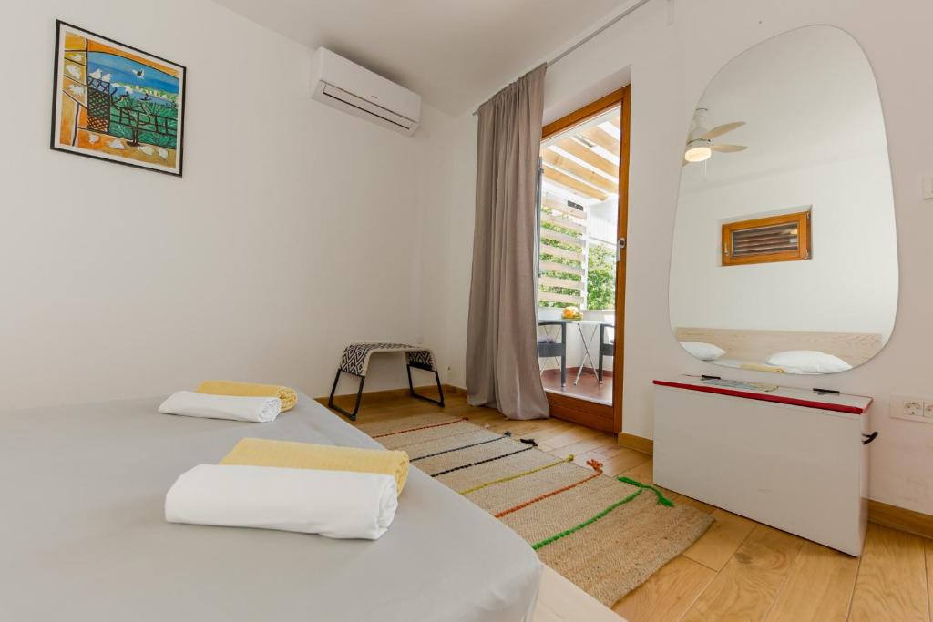 Postel nebo postele na pokoji v ubytování Casa Dubi Hvar
