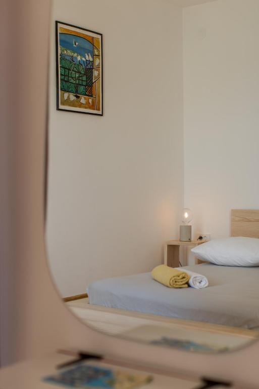 Postel nebo postele na pokoji v ubytování Casa Dubi Hvar