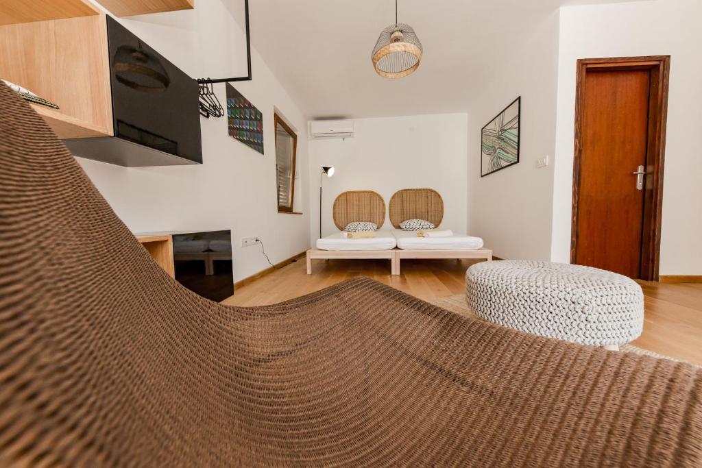 TV a/nebo společenská místnost v ubytování Casa Dubi Hvar