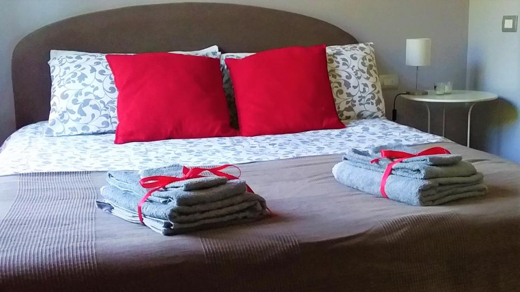 A bed or beds in a room at Casa Rachele