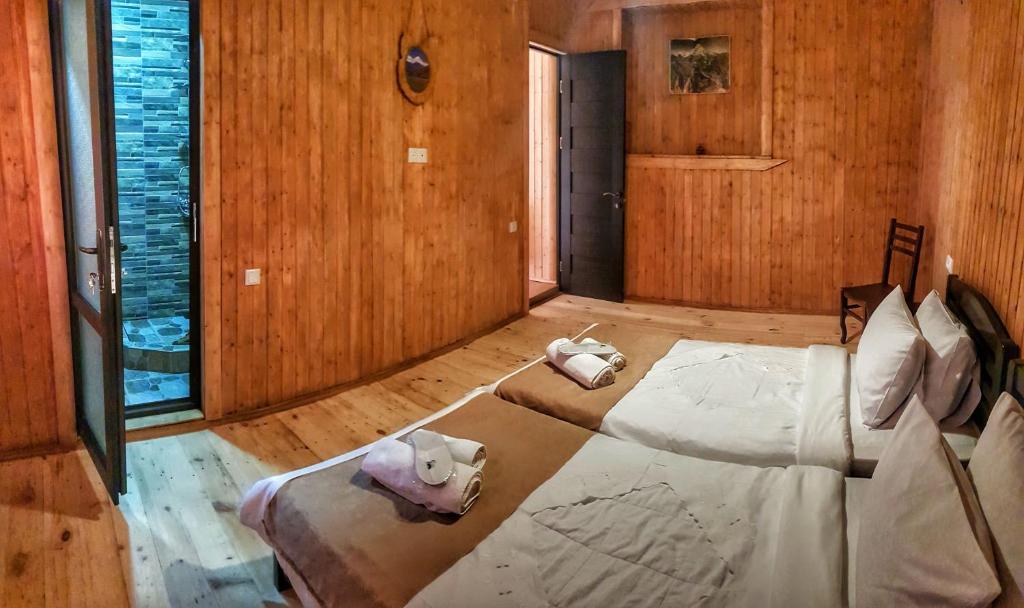 Postel nebo postele na pokoji v ubytování Bana