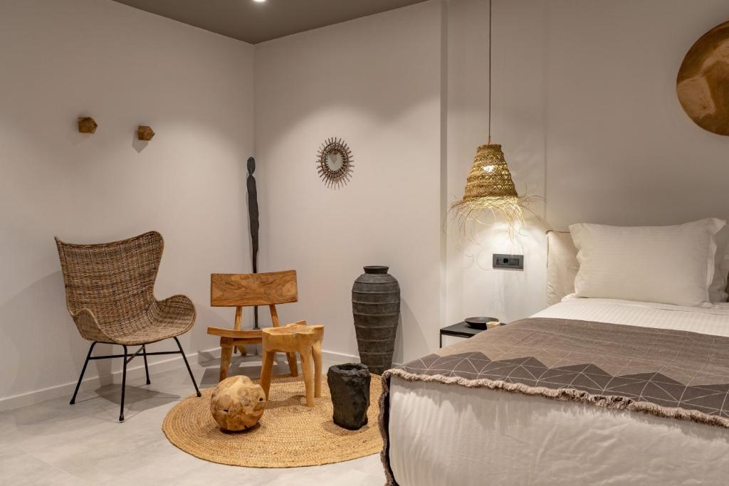 Postel nebo postele na pokoji v ubytování Lemon Suites Santorini
