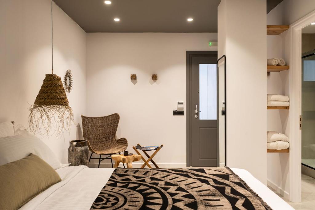 Postel nebo postele na pokoji v ubytování Lemon Suites Santorini