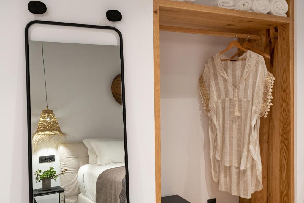 Postel nebo postele na pokoji v ubytování Lemon Suites Santorini