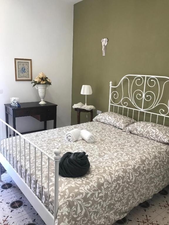 Postel nebo postele na pokoji v ubytování Maria Maddalena Holiday House