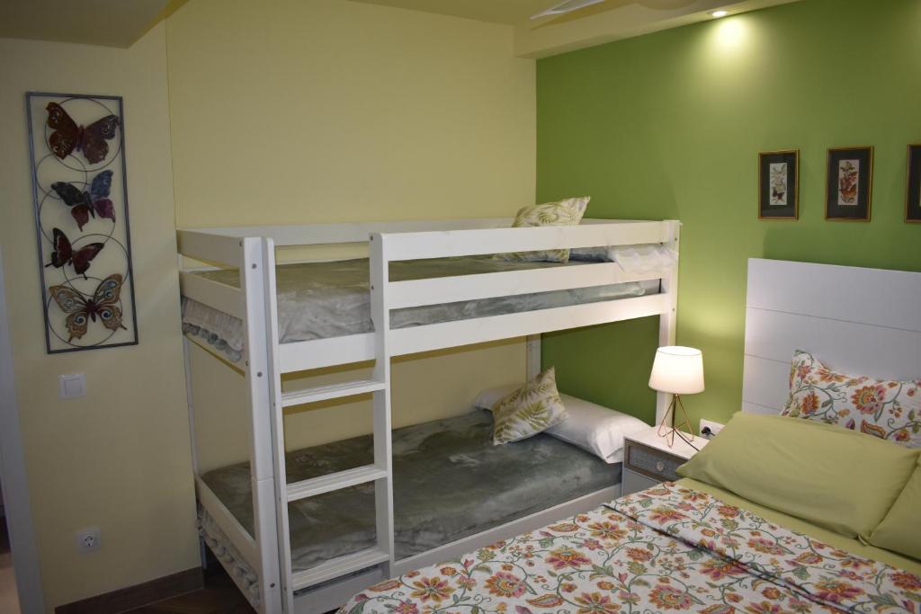 Postel nebo postele na pokoji v ubytování VILLA GARDEN