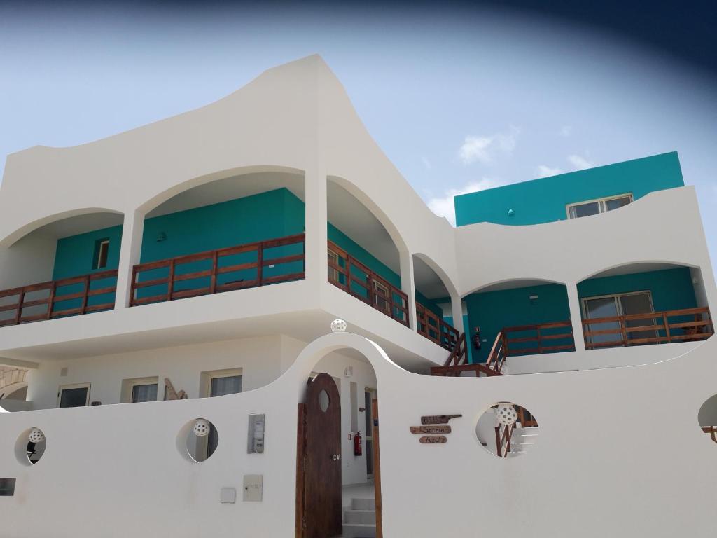 a view of a building with a balcony at B&B Sereia Azul Boa Vista in Sal Rei