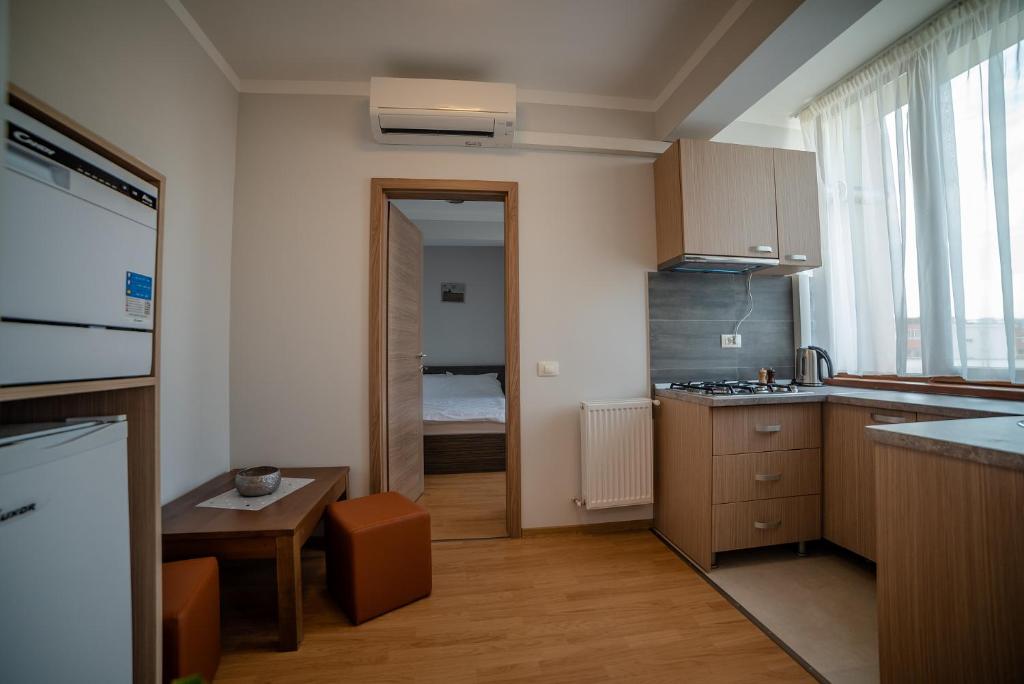 Kuchyň nebo kuchyňský kout v ubytování Elis Residence