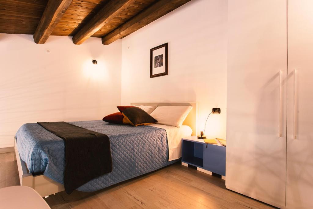 Postel nebo postele na pokoji v ubytování Ibla Barocca