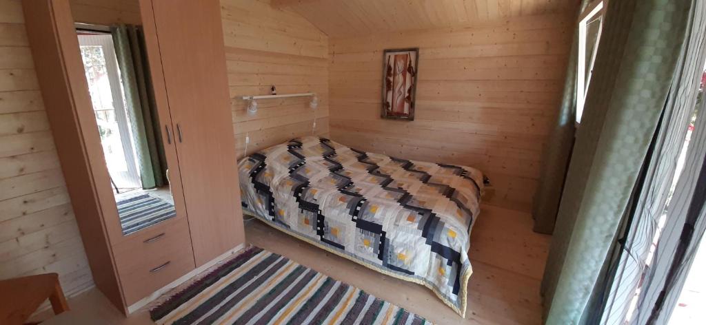 Postel nebo postele na pokoji v ubytování Nõva Madise Guesthouse