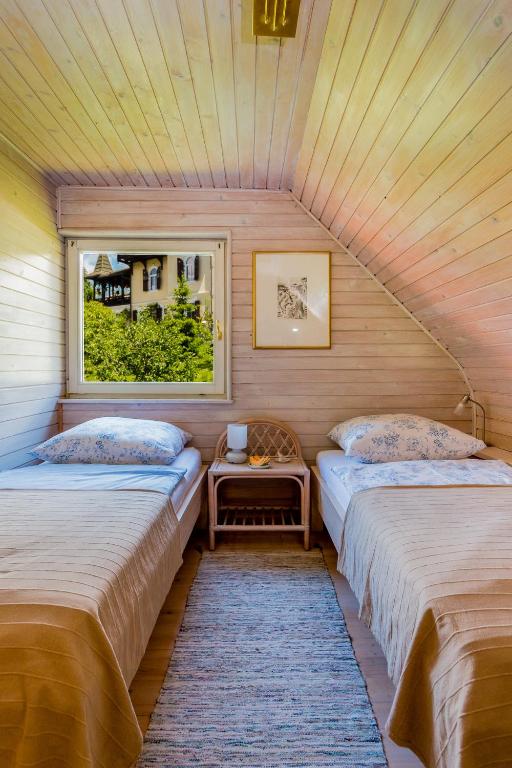 Postel nebo postele na pokoji v ubytování Bajtica Guesthouse