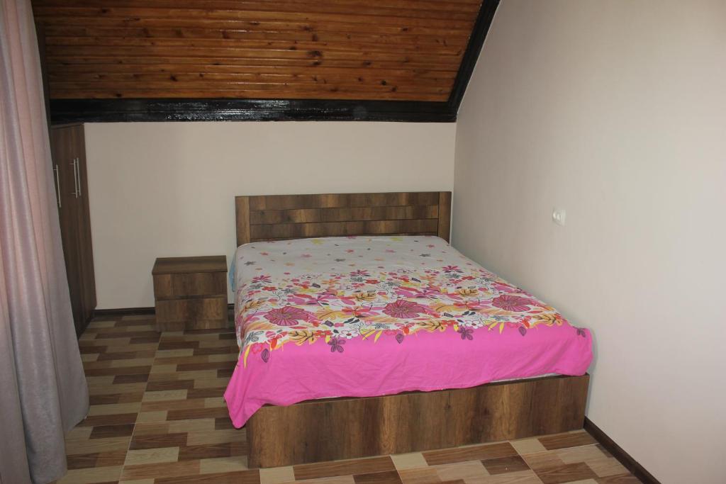 Postel nebo postele na pokoji v ubytování Grigoleti Relax Cottage