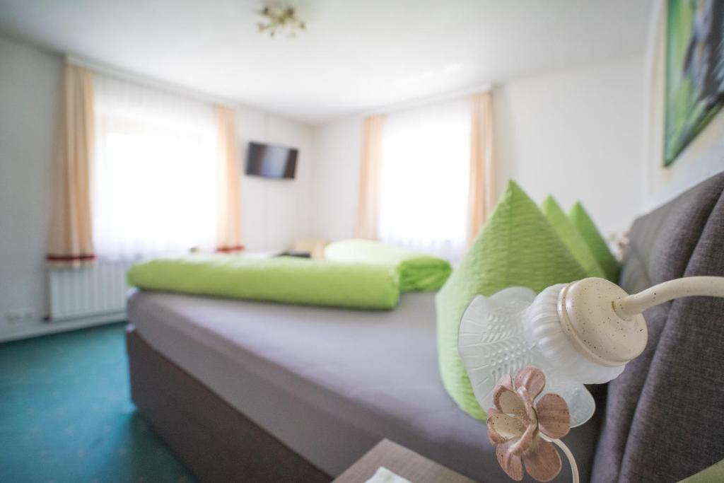 Postel nebo postele na pokoji v ubytování Ferienwohnung Permoser