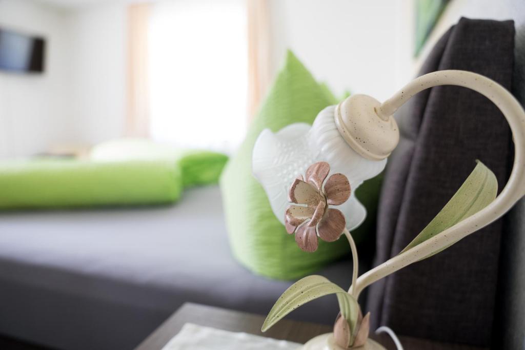 Postel nebo postele na pokoji v ubytování Ferienwohnung Permoser