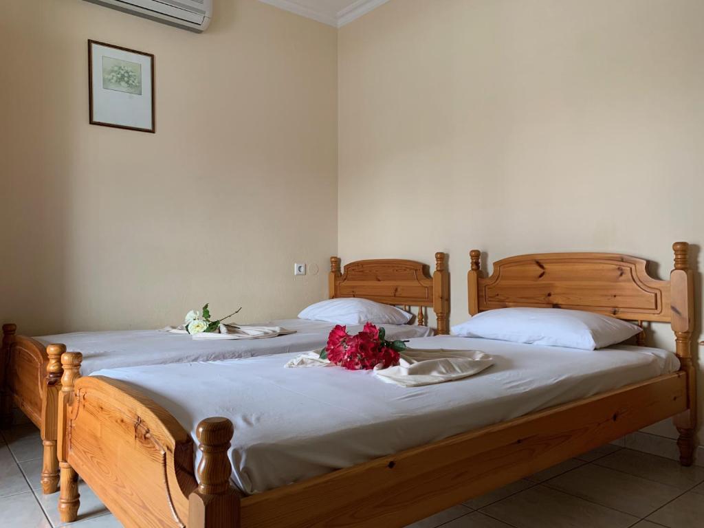 Posteľ alebo postele v izbe v ubytovaní helios apartmenthouse