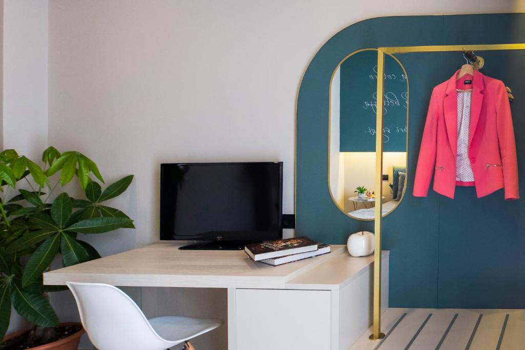 TV a/nebo společenská místnost v ubytování Hotel Europa