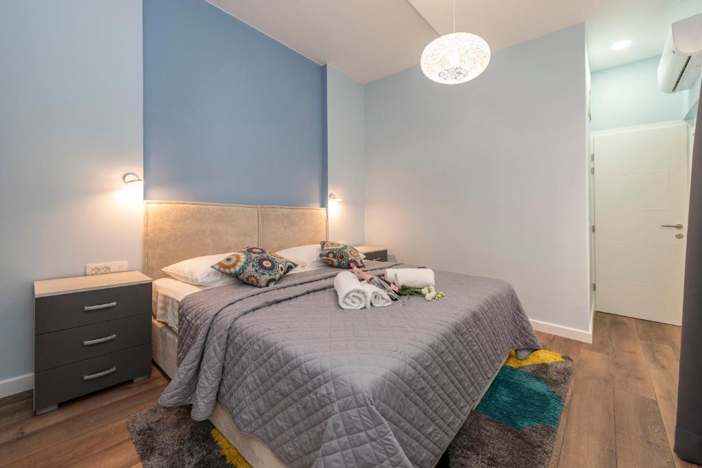 Postel nebo postele na pokoji v ubytování B&A Rooms Zadar
