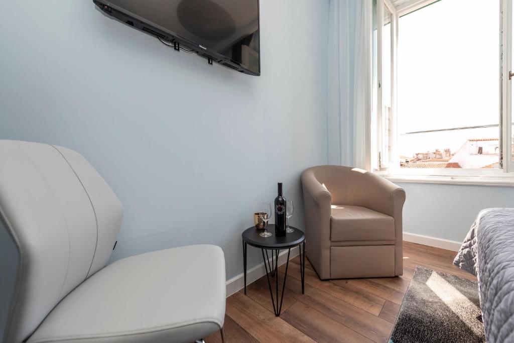 TV a/nebo společenská místnost v ubytování B&A Rooms Zadar