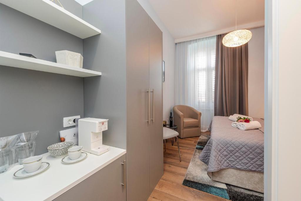 Postel nebo postele na pokoji v ubytování B&A Rooms Zadar