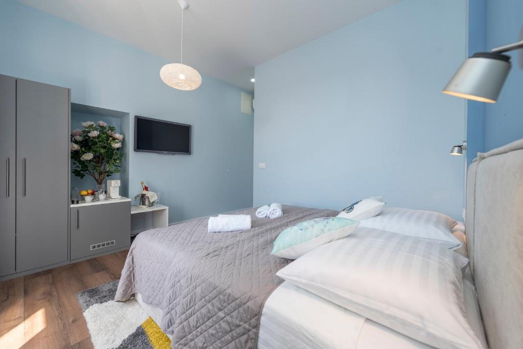 Postel nebo postele na pokoji v ubytování B&A Rooms Zadar