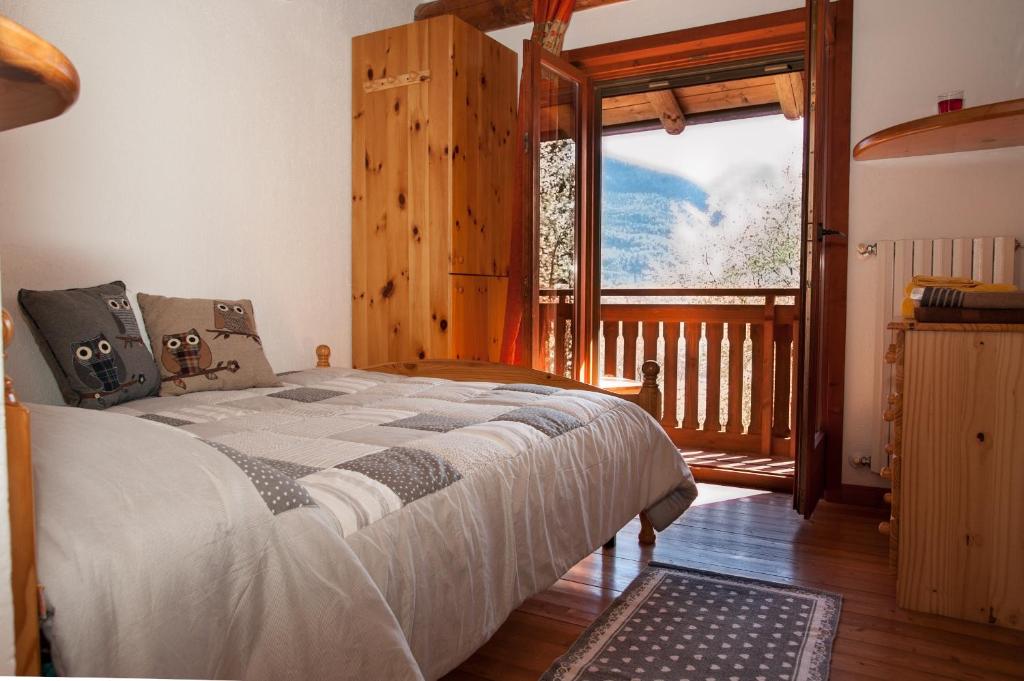 Postel nebo postele na pokoji v ubytování Agriturismo Luloc