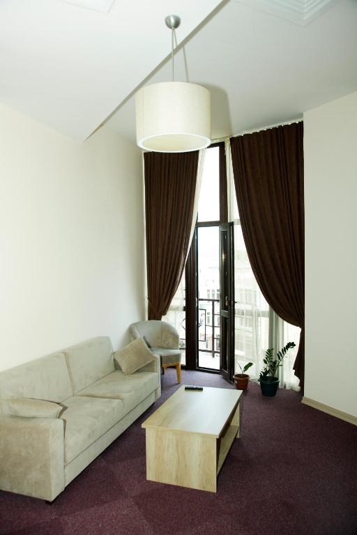 Posezení v ubytování Hotel Grand