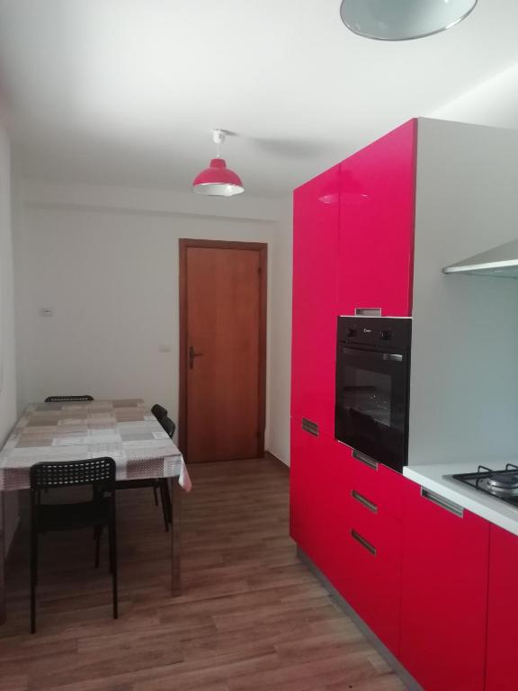 A kitchen or kitchenette at Casa Vacanze Villa Rosetta