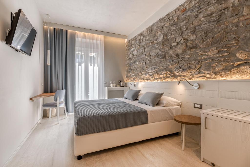 Llit o llits en una habitació de Amanarola