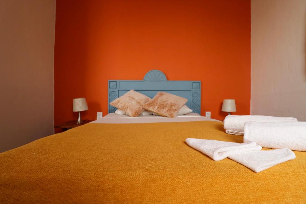 Postel nebo postele na pokoji v ubytování Wabi Hostel