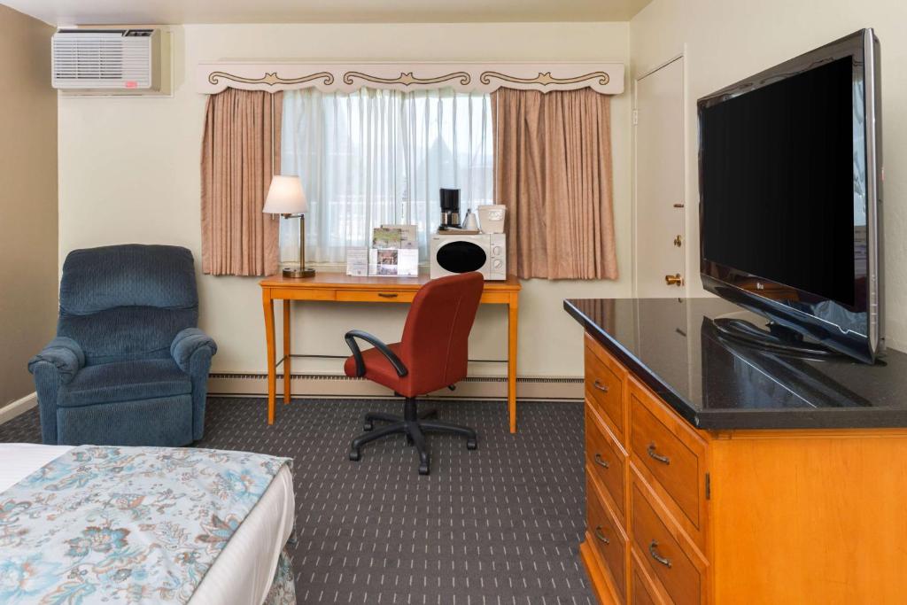 Svendsgaard's Lodge- Americas Best Value Inn & Suites - Deluxe Kamer Met Kingsize Bed