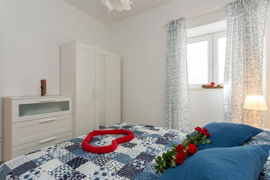Posteľ alebo postele v izbe v ubytovaní Apartments Luksic