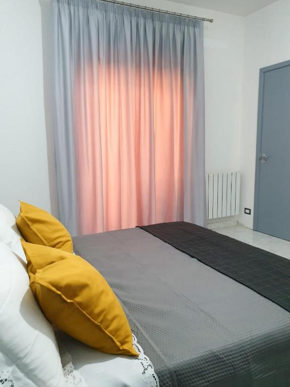 Postel nebo postele na pokoji v ubytování B&B TERRA DI MITI