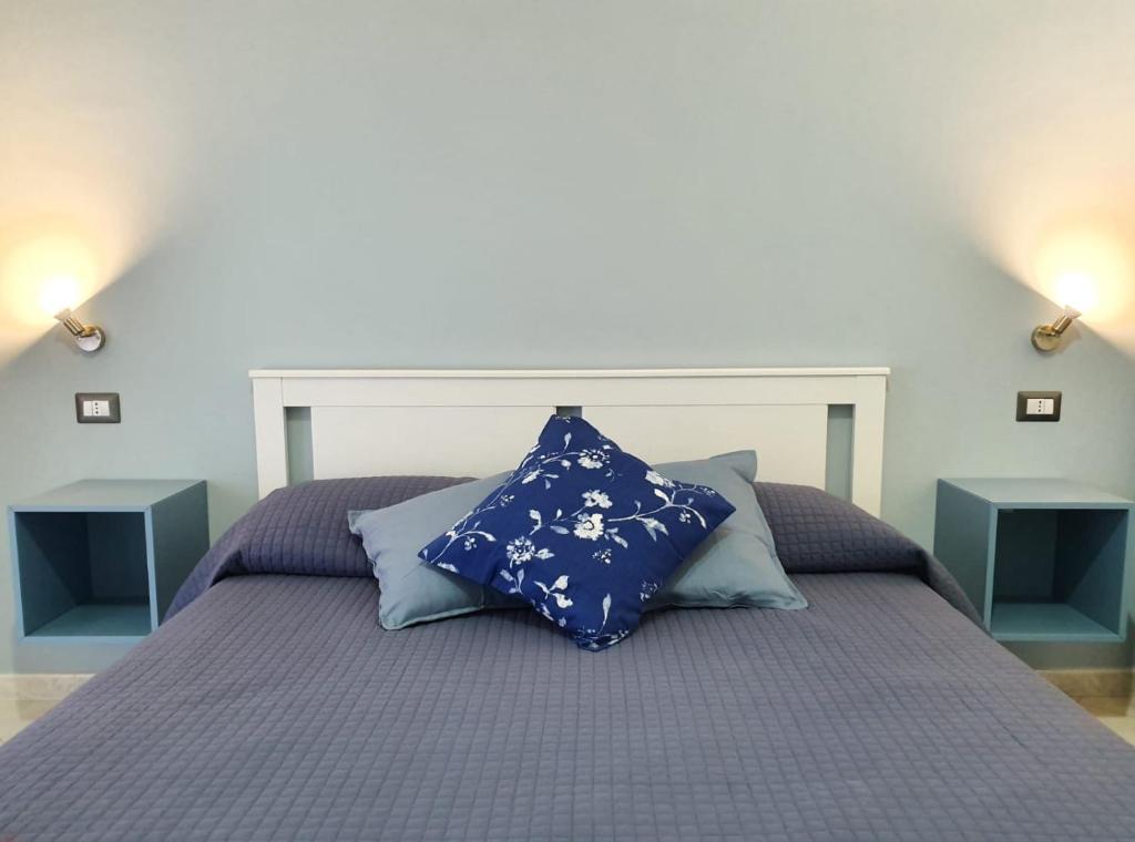 Postel nebo postele na pokoji v ubytování B&B TERRA DI MITI