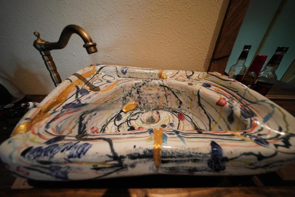 Postel nebo postele na pokoji v ubytování ARtINn 極寒藝術伝染装置