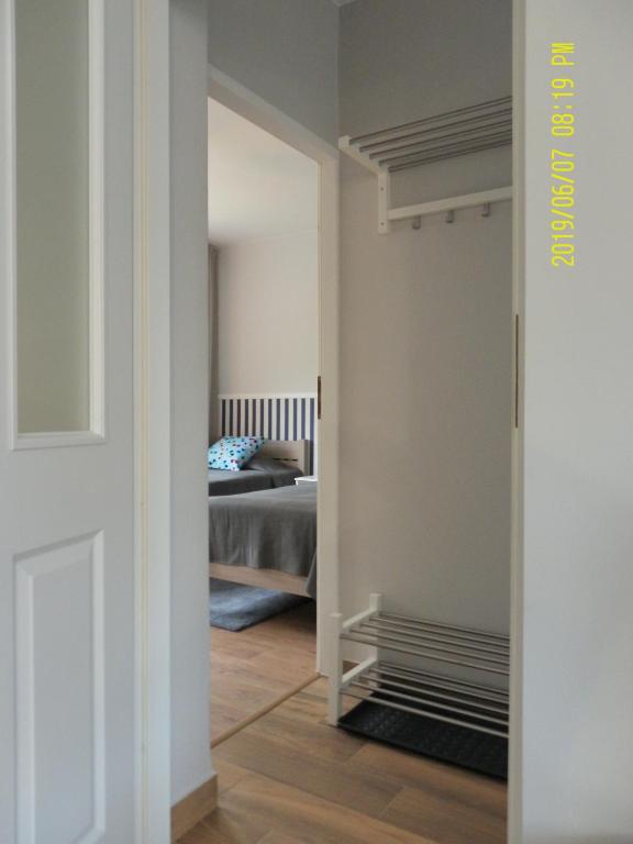 Posteľ alebo postele v izbe v ubytovaní Apartamenty Premium 200m. do plaży