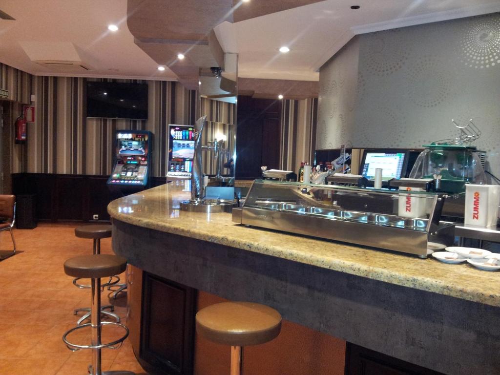 Lounge alebo bar v ubytovaní Alojamientos Río Cares