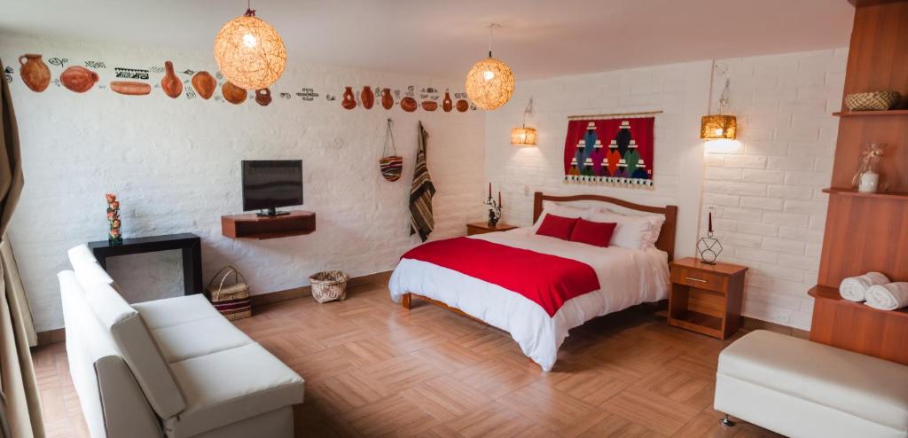 Postel nebo postele na pokoji v ubytování La Floresta Hotel