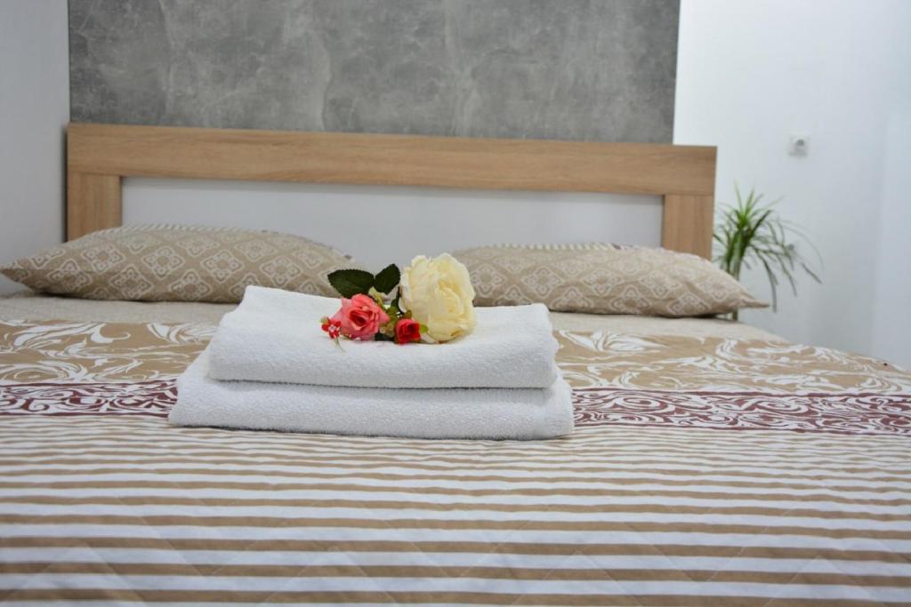 Postel nebo postele na pokoji v ubytování Hostel Center