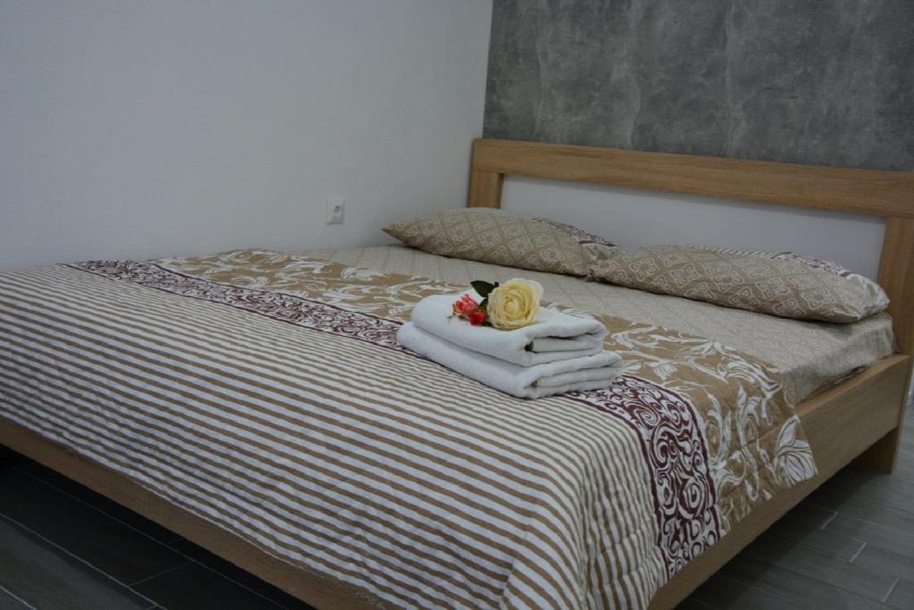 Postel nebo postele na pokoji v ubytování Hostel Center