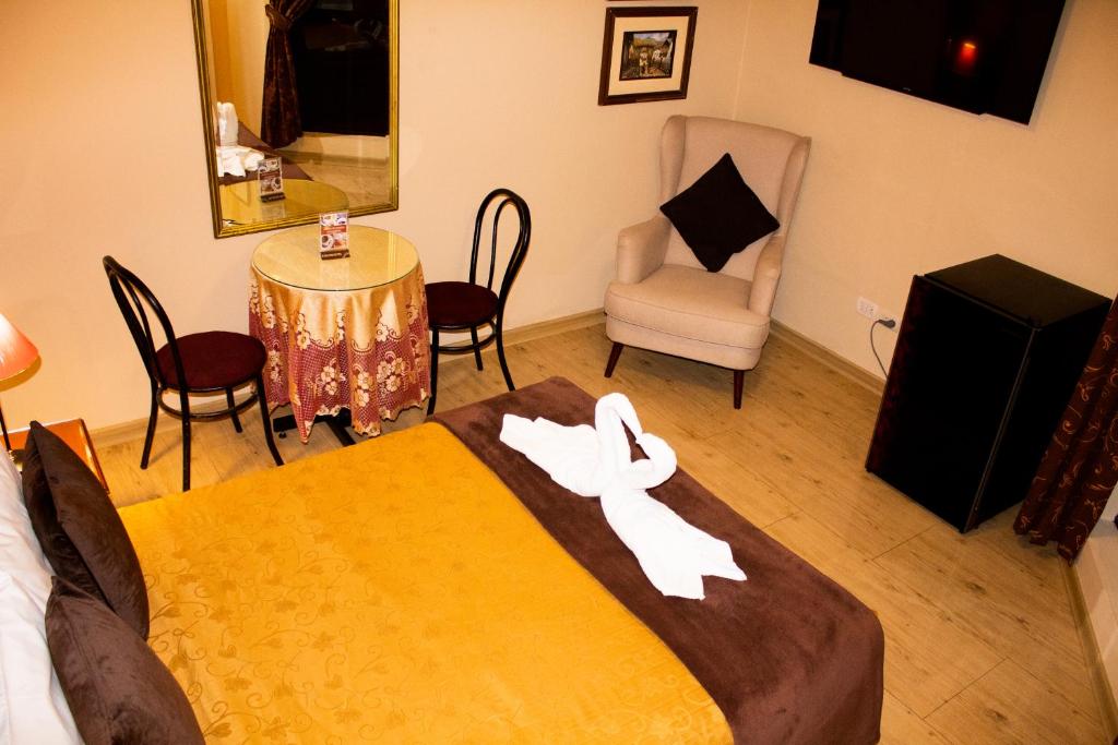 Postel nebo postele na pokoji v ubytování Solis Dies Hotel