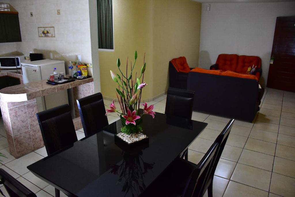Kuchyň nebo kuchyňský kout v ubytování Hotel Suite Azomali