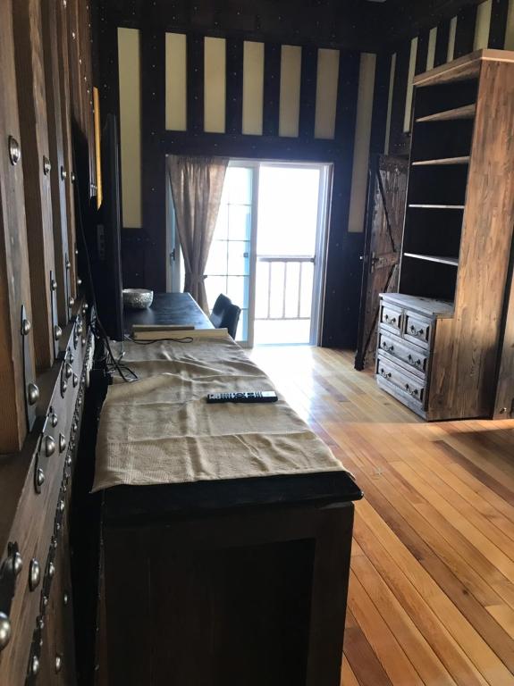 Postel nebo postele na pokoji v ubytování Black Forest Manor